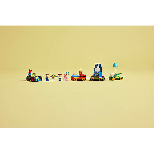 Конструктор LEGO Disney Pixar Святкування з Історії Іграшок: потяг і авто для перегонів