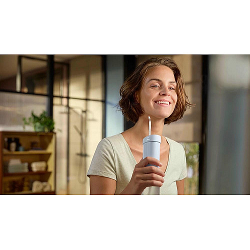 Ирригатор Philips портативный Sonicare Compact Flosser 1000, чаша 200 мл, складной, голубой