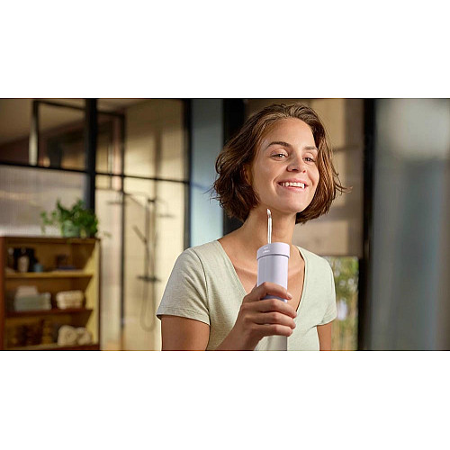 Ирригатор Philips портативный Sonicare Compact Flosser 1000, чаша 200 мл, складной, фиолетовый